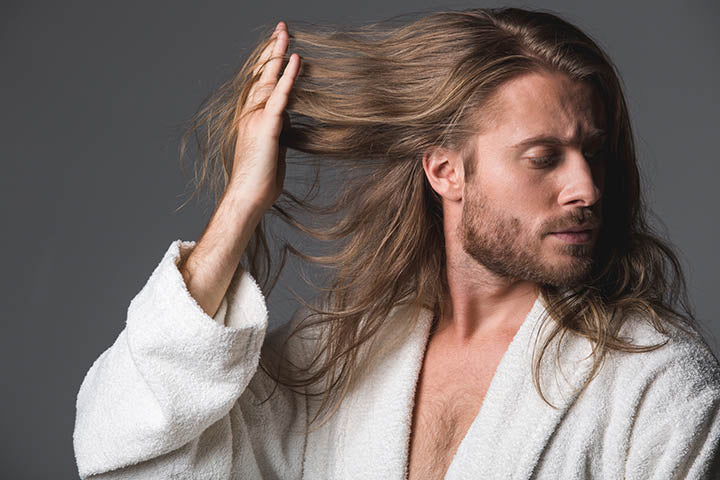 handsome man with beard and wavy hair