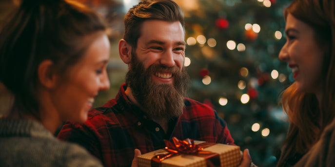 man receiving beard product bundle gift