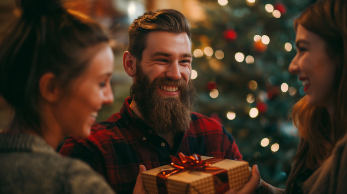 man receiving beard product bundle gift