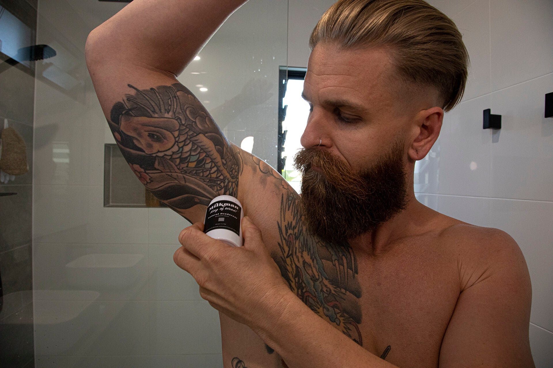 man using australian made natural deodorant for men by milkman